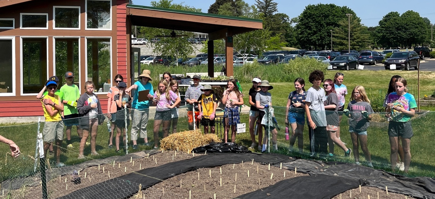 Upper Montessori Students Gardening